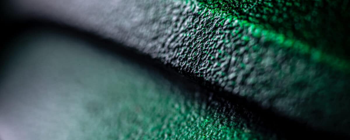 Extreme close up of plastic surface dark background. Abstract super macro background