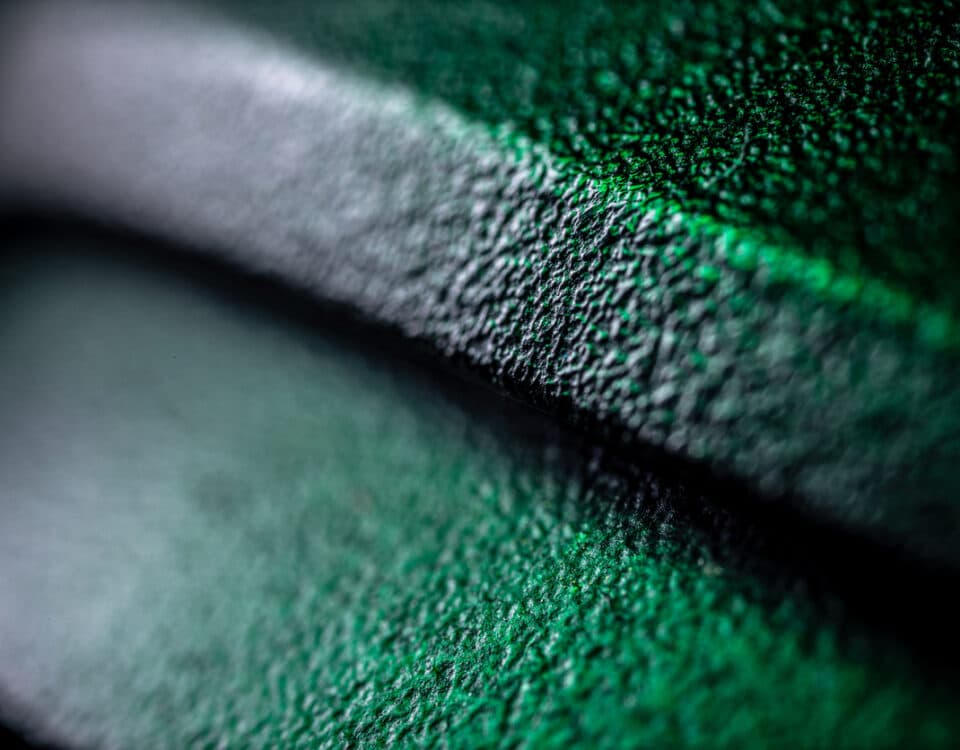 Extreme close up of plastic surface dark background. Abstract super macro background